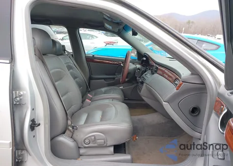 2003 Cadillac Deville Standard z USA, uszkodzony, nr VIN 1G6KD54Y03U143931